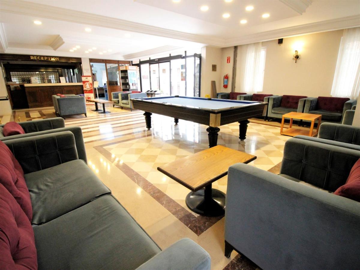 Montania Town Hotel Муданья Экстерьер фото