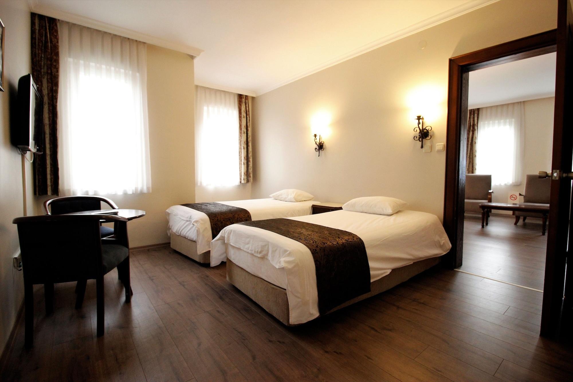 Montania Town Hotel Муданья Экстерьер фото