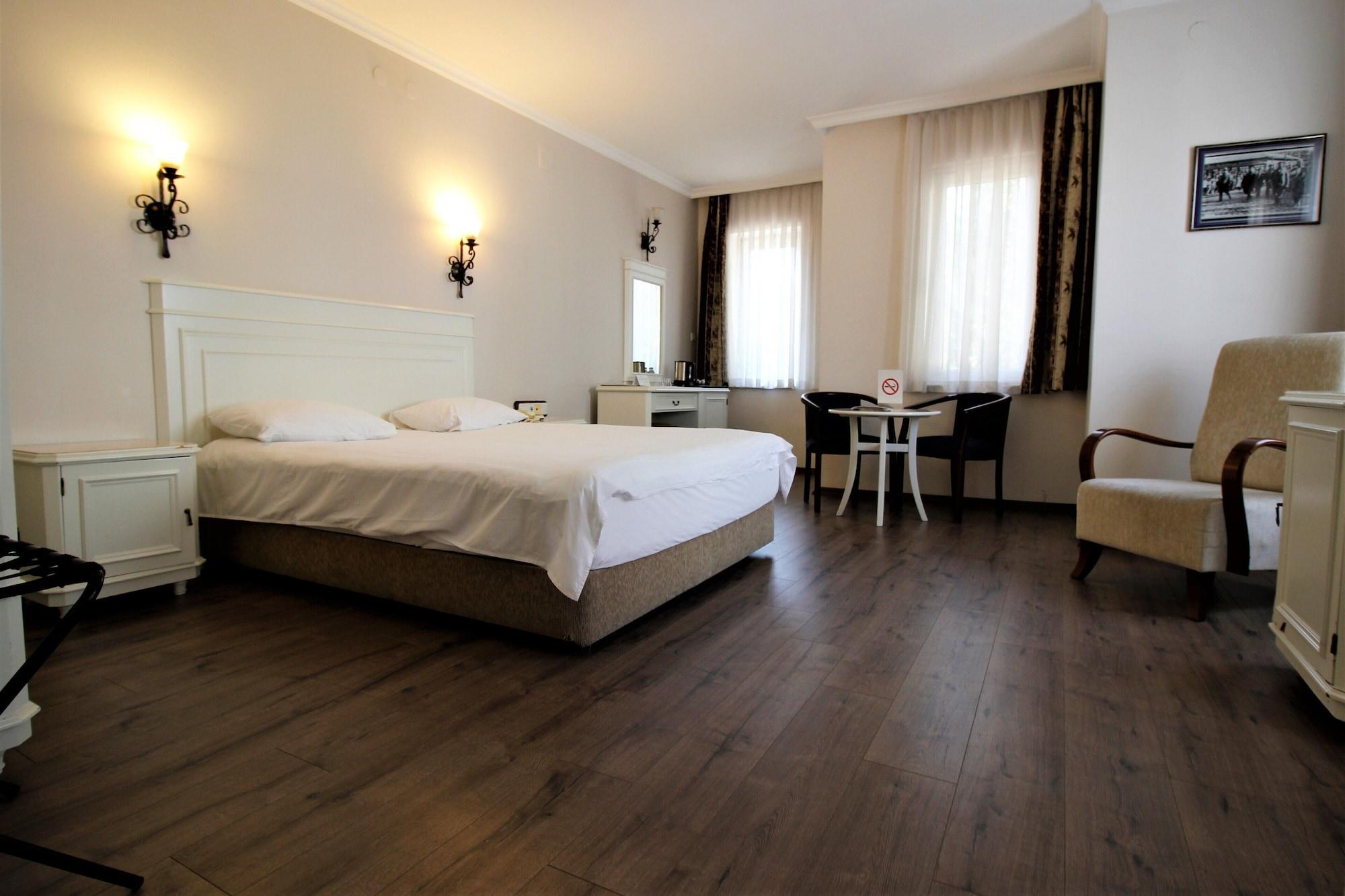 Montania Town Hotel Муданья Экстерьер фото